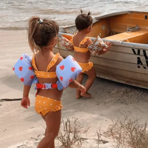 Kort simväst med armpuffar - Blommigt hjärta